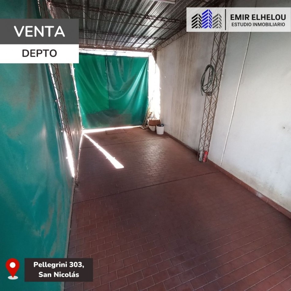 Departamento de dos dormitorios con cochera en Pellegrini 303